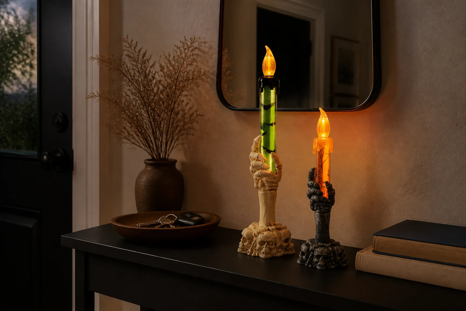 Skeleton-hand candle light on an entryway console table